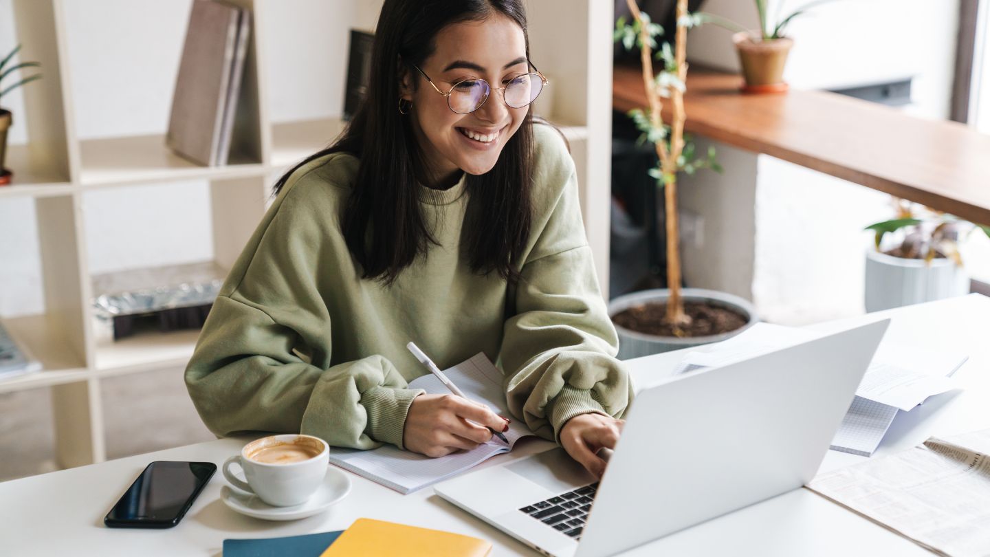 Student Studying Online With A Laptop